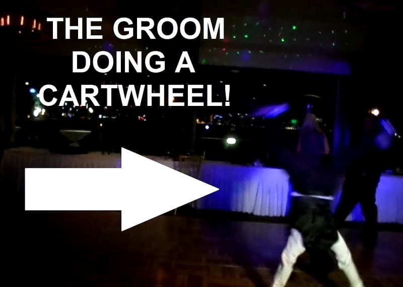 Groom Doing Cartwheel on Dance Floor